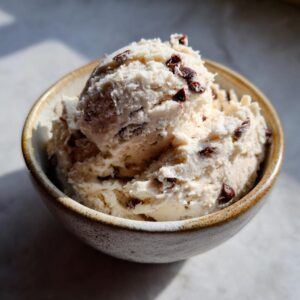 A bowl of delicious Cottage cheese cookie dough with chocolate chips.