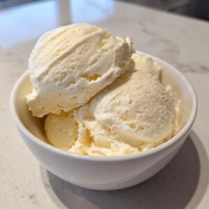 A bowl of delicious, creamy cottage cheese ice cream, ready to be enjoyed.